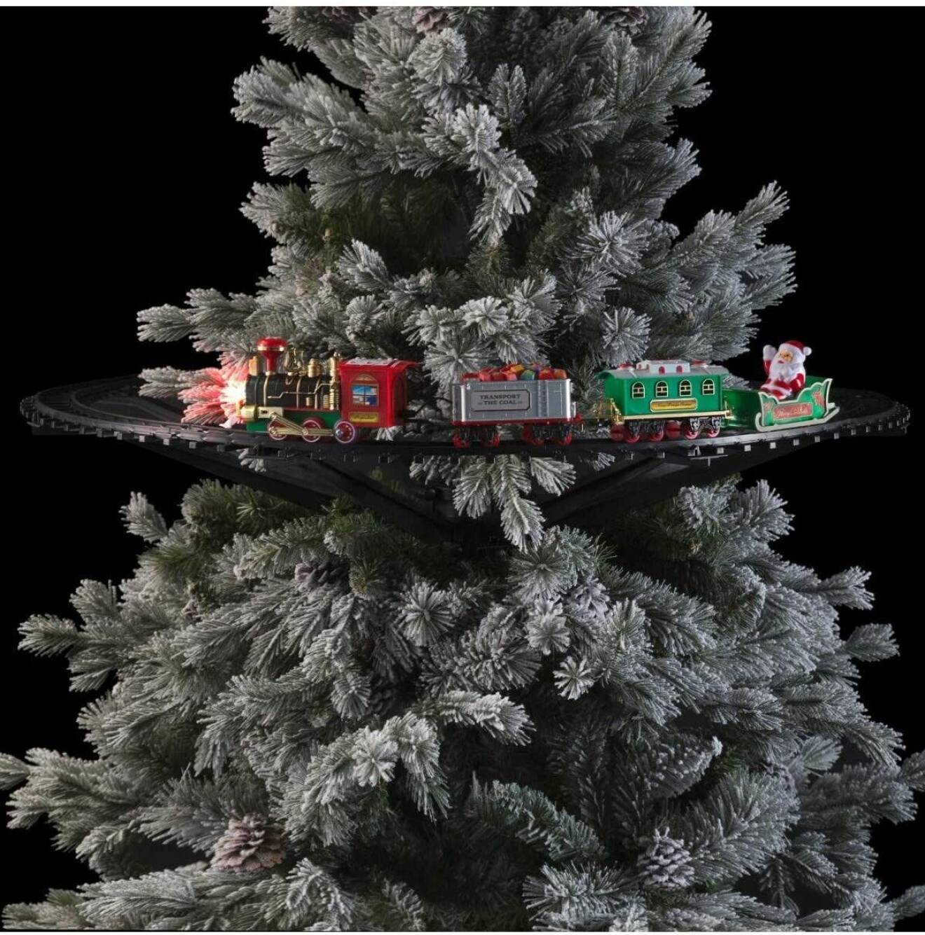 julgranståg som sitter fast i granen