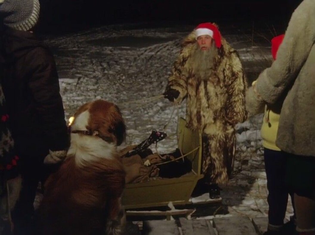 Tomten med släde och julklappar
