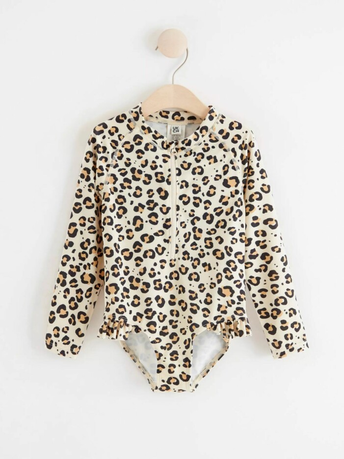 leopardfärgad uv-dräkt